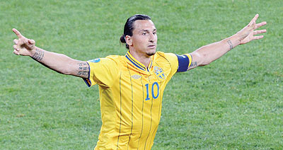 Zlatan Ibrahimovic made history by netting four times against England. Net photo.