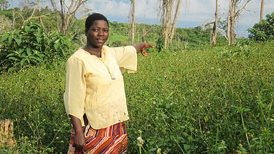 Jennifer Makune showing off her land. Net photo.