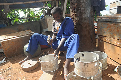 A youth making a charcoal stove. The youth in Southern Province have been trained on managing their own businesses. The New Times / JP Bucyensenge.