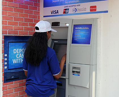 Several credit cards can be used to purchase goods. The New Times / File.