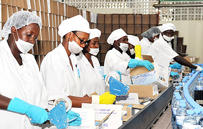 Workers at agro-processing firm Inyange Industries; Rwanda has huge potential in agro-processing and agribusiness. The New Times/File.