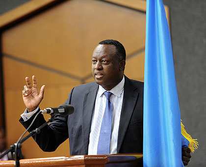The State Minister for Cooperation and Rwandau2019s Permanent Representative to the United Nations, Ambassador Eugu00e8ne-Richard Gasana, taking the oath of office at the Parliamentary Buildings yesterday. The New Times/Village Urugwiro. 