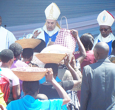Pilgrims giving their offerings at Kibeho. The New Times / File.