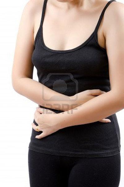 A woman suffering from abdominal pain