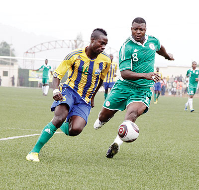 Amavubi missed the experience of  Karekezi,  Kagere and Mbuyu (left), seen here in action against Nigeria in the 2013 CAN qualifier in March. The New Times/File.