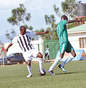 Jean Claude Iranzi (left) opened the scoring for the 13-time league champions on the half hour mark. The New Times / Plaisir Muzogeye.