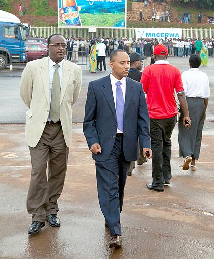 Crystal Ventures chairperson Manasseh Nshuti (L) and CEO John Bosco Birungi arrive at the expo