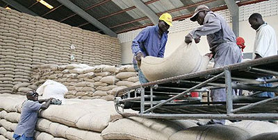 Off loading maize grain at a warehouse. Bakhresa Grain Millers Rwanda seeks to empower local farmers in order to supply them with raw materials. The New Times / File .