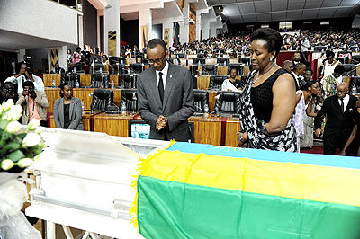 President Paul Kagame and the First Lady Jeanette pay their last respects to the late Gender and Family Promotion minister Aloisea Inyumba at Parliament yesterday.