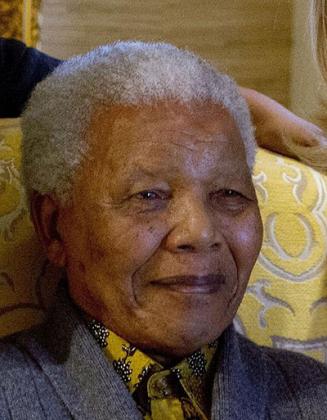 This photo taken Monday Aug. 6, 2012 shows former South African president, Nelson Mandela, when he met with US Secretary of State Hillary Rodham Clinton, unseen, at his home in Qunu, South. Net / photo