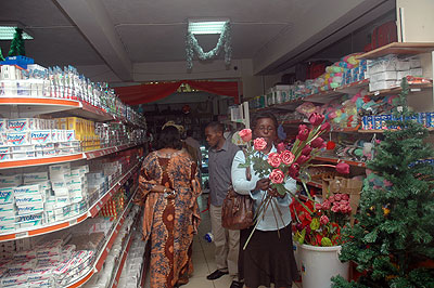 Shoppers in a retail store in Kigali. Local traders have said most regional products are outcompeting them on the market. The New Times / Courtesy.