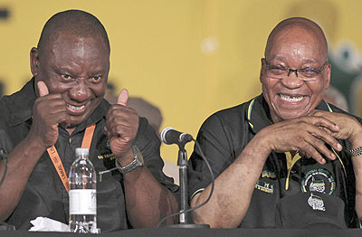 African National Congress (ANC) re-elected President Jacob Zuma, right, with his new deputy Cyril  Ramaphosa, left, during their elective conference at the University of the Free State in Bloemfontein, South Africa, on Tuesday, Dec. 18, 2012. Net photo