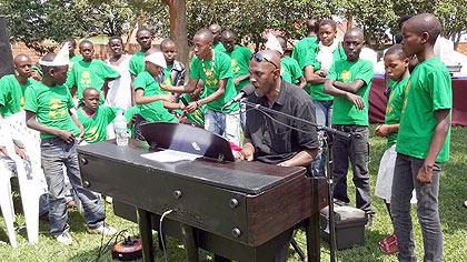 Kim Thuita with music students