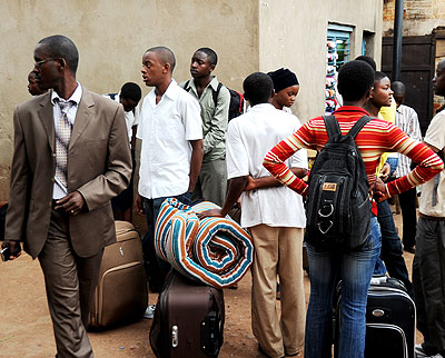  Students await buses in Nyabugogo bus and taxi terminal on their way back school in the past. The New Times/File.