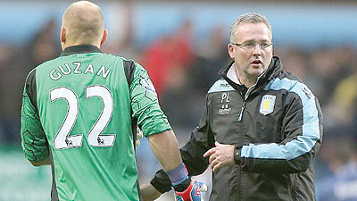 Lambert (right) believes Aston Villau2019s upcoming cup ties will ease the pressure on their Premier League worries. Net photo.