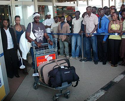 Incoming passengers at Kigali International Airport . The New Times / John Mbanda.