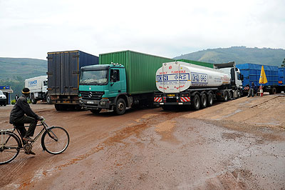 Trucks await clearance at the Gatuna border post; Slow internet has affected the newly introduced electronic clearance of goods. The New Times / File.