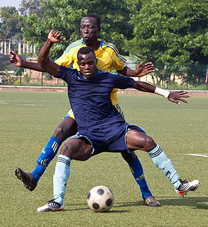 Policeu2019s Peter Kagabo shields the ball during the match against Amagaju yesterday. Police won 3-0  to move to fourth spot on the league table. The New Times / T. Kisambira.