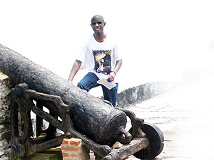 The writer poses at one of the four canons that were positioned outside the castle to guard against invaders.