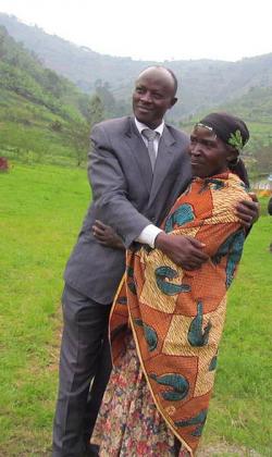 Rulindo Mayor with a poor villager he is tasked with guiding  to economic freedom. The New Times/Courtesy.