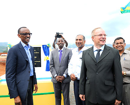 CIMERWAu2019s Peter Esterhuysen shows President Kagame around the new site of the  cement factory. The New Times/Village Urugwiro.