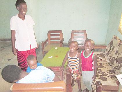 Clotilde Nibagwire and her family at their new home in Ituze, Kimihurura Sector.  The Sunday Times /Eugene Kwibuka