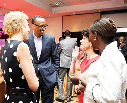 President Kagame and Minister Louise Mushikiwabo chat with Rwanda Inc. authors, Andrea Redmond and Patricia Crisafulli on Friday. Sunday Times / Village Urugwiro.