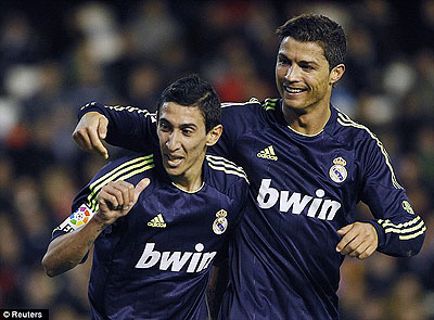 Angel Di Maria (left) and Ronaldo celebrate one of Real's goals. Net photo.