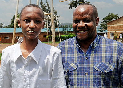 Kwibuka and Tuyisenge at the school in Ndera yesterday .  The New Times/ John Mbanda.
