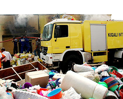 From the past, a fire fighter truck from Aviation Authority puts out a fire in Kigali. The New Times/ File