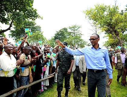 President Kagame greets the crowd gathered to welcome him in Rusizi last week. The New Times/  File. 