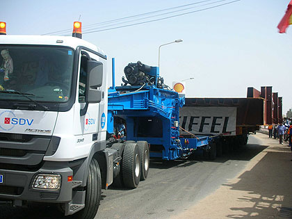 The firmu2019s truck ferrying cargo. Bolloreu2019s new look (inset).  The New Times / File.