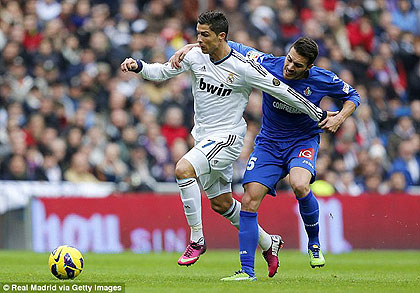 Ronaldo scored his 300th club goal as Real Madrid smashed Getafe 4-0 in an early kick-off.  Net photo.