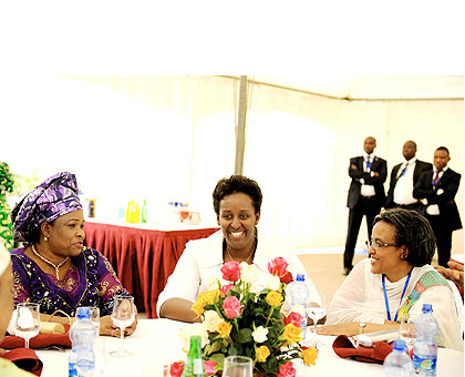 First Lady Jeannette Kagame (C) and her counterparts, Nigeriau2019s Patience Jonathan (L) and Roman Tesfaye of Ethiopia meet at a luncheon in Addis on the sidelines of the ongoing AU Summit.