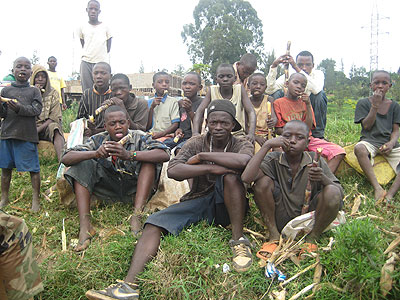 Jack Nshimiyimana(C) with other street kids before joining school.  The NewTimes / Patrick Buchana.