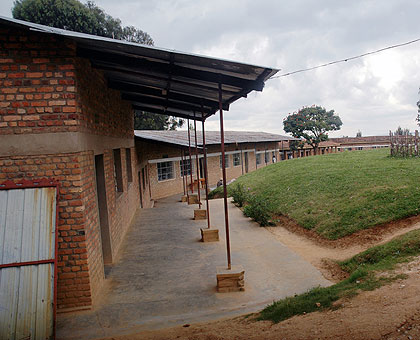 Above: Nyange SS today, while top, Sindayiheba relives the gory experience of March 18, 1997, at the bloody scene. The New Times/ File.