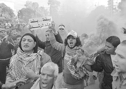 Protesters denouncing Egyptu2019s Islamist president hurled stones and firebombs through the gates of his palace gates on Friday. Net photo.