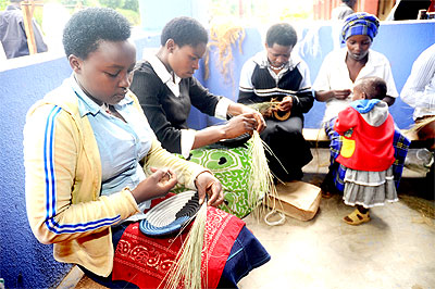 Members of a womenu2019s co-operative weave baskets. Starting such a business needs planning.  The New Times / File.
