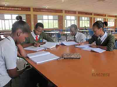  Students of Rivera High School revise in the school library . The New Times/ Allan B. Ssenyonga
