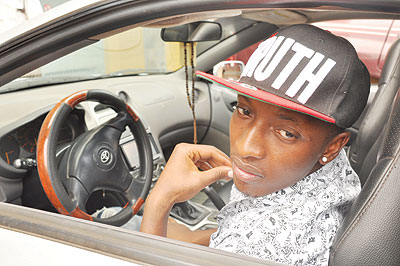 Nizzo besides his car.