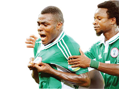 Nigeriau2019s Emmanuel Emenike celebrates after scoring his fourth goal of the tournament. Net photo.