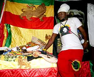 A vendor poses with his goods. Photos by David Winston Hansen.