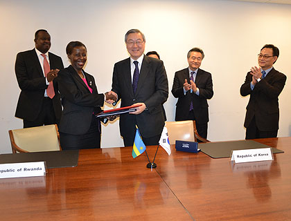 Mushikiwabo and Kim Sung-Hwan, after signing the deal. The New Times/ Courtesy. 