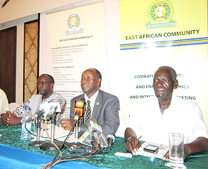 L-R: Onyonyi, Dr Rotich and  EAC Assistant Commissioner Modest L Mwanzi, who is also Tanzaniau2019s Police commander of arms management and disarmament unit at the news conference, yeste....