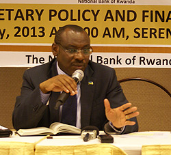 Governor Claver Gatete addresses reporters about the economyu2019s performance in the second half of 2012 on Friday at the Kigali Serena Hotel.. The New Times / File.
