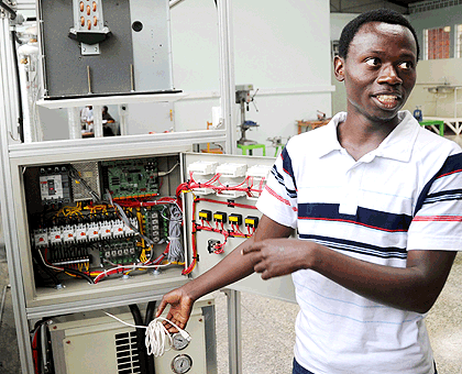 A technical student at IPRC gestures at installations. The New Times/  Net