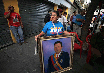 Hugo Chavez makes a surprise return home; Venezuelan president was recovering from cancer surgery in Cuba for the past 10 weeks, raising questions about who has been running the nation....