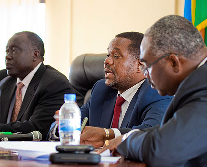 Minister Karugarama (L) Majola, (C)  and Roland Kouassi G. Amoussouga, the ICTR spokesperson  during a meeting yesterday. The New Times/Timothy Kisambira. 