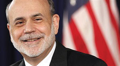 US Federal Reserve chairman Ben Bernanke smiles during a news conference in  Washington . Net photo.