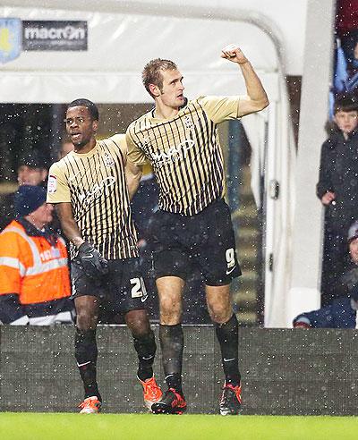 Hanson (right) scored to help Bradford beat Aston Villa and reach the final at Wembley, and  Michu  (inset) will lead Swanseas City attack against Bradford City on Sunday. Net photos.